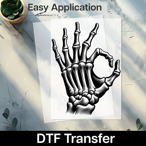 Spooky Skeleton Hand OK DTF Transfer Gothic Halloween Humor Edgy Apparel for Halloween Enthusiasts & Dark Humor Fans