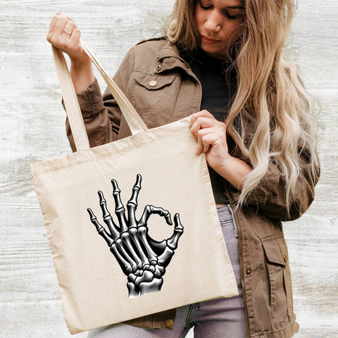 Spooky Skeleton Hand OK DTF Transfer Gothic Halloween Humor Edgy Apparel for Halloween Enthusiasts & Dark Humor Fans